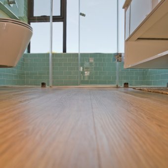 Beautiful laminate herringbone installation throughout a Home in Zimbali.