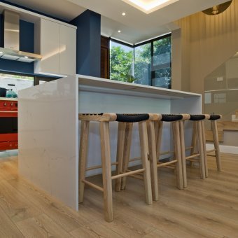 Beautiful laminate herringbone installation throughout a Home in Zimbali.